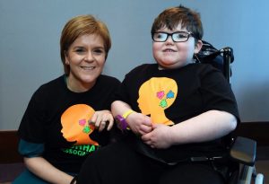First Minister Nicola Sturgeon at the Golden Jubilee hospital where she met Aaron Hunter. Aaron suffers from a rare condition and can't stop eating. Pictured: Aaron and his family meet the Nicola Sturgeon and exchange presents